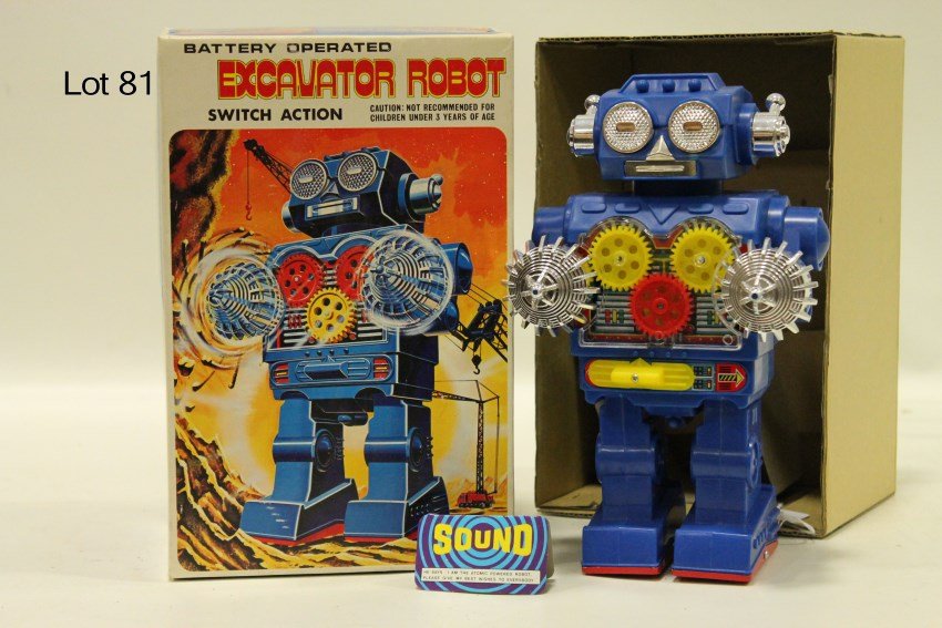Escavator Robot in O/Box ( 1 of 8 in Auction): Battery operated, 9 1/2" H "Excavator Robot" switch action, walks forward, revolving gears and drills, realistic drill sound, Trademark "SH", made in Japan, all plastic, like new condition.