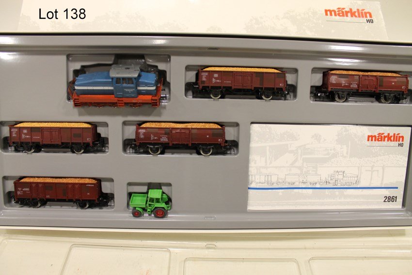 Marklin HO 2861 Train Set, Sugar Beet Train: In original box. Diesel-Hydraulic Switch Engine, 5 Gondolas, Removable Sugar Beet Load Inserts, Individual Car Numbers & Are Weathered. Model of Tractor.