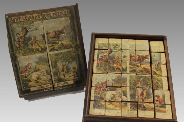 19th C. Aunt Louisa's Cube Puzzles - Doings of the: Last quarter 19th century, paper on wood, Aunt Louisa's Cube Puzzles , 30 lithographed cube blocks make up 6 puzzles, wooden box, slide lid lithographed with one set of puzzles, square nail constructi
