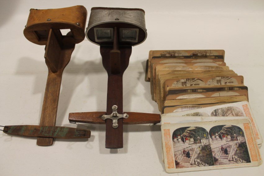 Stereoviewers & Cards: Pair steroviewers and 60+ stereo view cards - one viewer stamped 1900 International Exhibition (worn lettering).