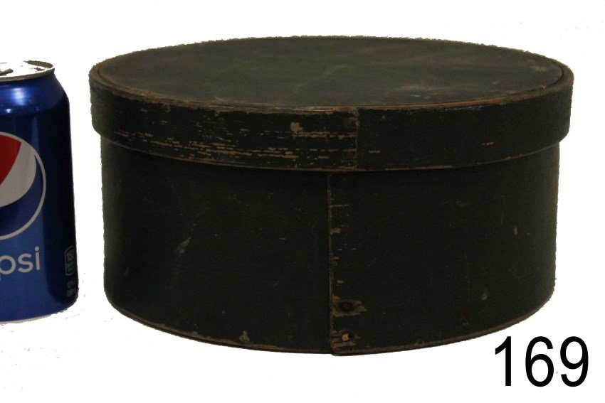 Dark Green Pantry Box: 19th century, round bentwood pantry box, dark green paint, lapped seams with iron tacks, 9 3/4" W x 4 1/4" H, condition - good - some scuffed paint.