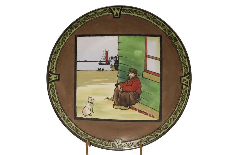 Nippon Noritake Dutch Holland Charger: Dutch man with cat scene, signed Hand-Painted M in wreath, Nippon, 10" W. Condition - good.