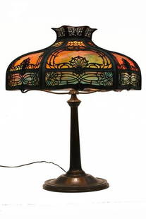 Filigree Bent Panel Lamp Bronze Base: Blazing colors of orange, red/orange, gold and green, no signature found, probably Miller or Handel, 25" H. Condition - good.