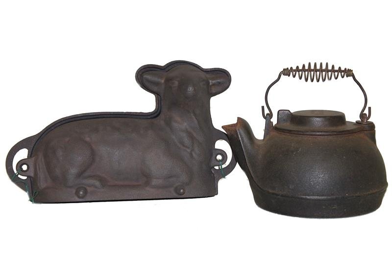 Wagner Ware Iron Teakettle & More: Teakettle signed on swing lid; cast iron lamb cake mold. Condition - good.