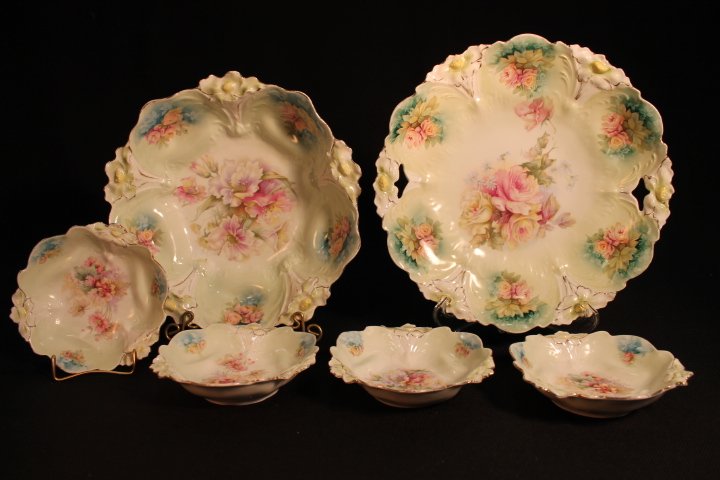 UM Prussia Berry Bowl Set w/Cake Plate: Unmarked Prussia Berry Bowl set w/ 4 small bowls and Handled Cake Plate, Lily Mold, Green & floral dÃ©cor, Berry Bowl 10 3/4" W X 3" D, Cake Plate 11 W X 1 3/4" D, Small Bowls 5 3/4"W X 1 1/2" D.
