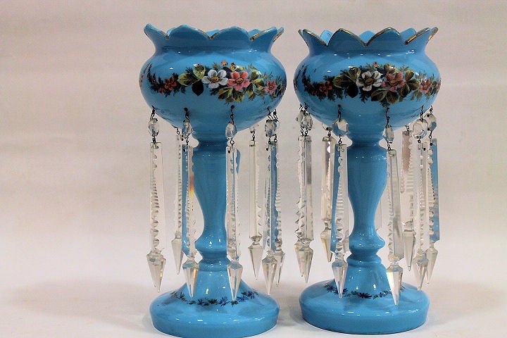 Blue Victorian Mantle Lusters w/ Long Prisms: Blue Victorian mantle lusters, crown-form tops, hand-painted floral sprays with hovering bees, each with eight suspended cut glass prisms. Condition - no issues noted.