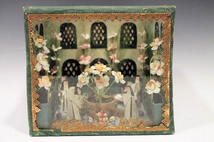 Victorian Diorama Abbey Courtyard with Nuns: Victorian diorama depicting an abbey / convent with nuns in courtyard under square glass and paper mache dome, 8" W x 7 1/2" H. Condition - good.