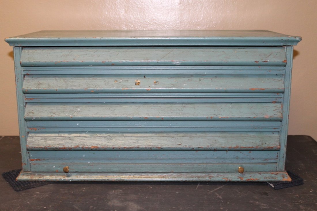 19th to Early 20th C Optician's / Jeweler's Cabinet: 19th to early 20th century optician's / jeweler's cabinet, 3 of the drawers' interiors sectioned with wooden slats, bottom drawer is slide out shelf, 14" H x 26 1/2" W x 13" D. Condition - old repaint