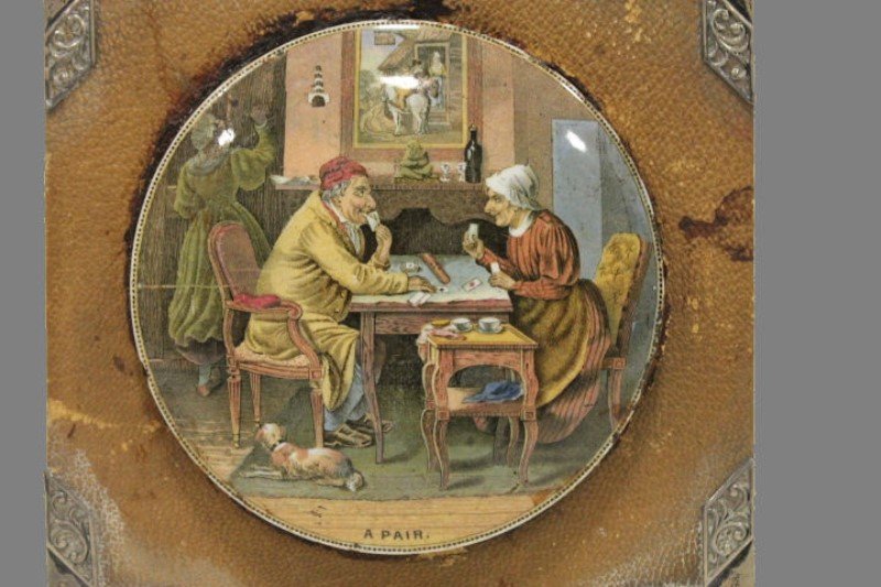 Pot Lid Depicting 19th C Couple Playing Cribbage (1 of 2)