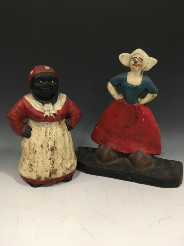 Mammy & Dutch Girl Doorstops: Mammy and Dutch Girl doorstops. Good with crazing, paint loss and rust, Dutch girl old repaint.