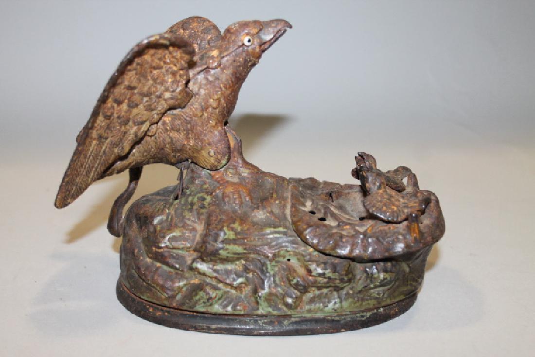 1883 Eagle & Eaglets Cast Iron Mechanical Bank