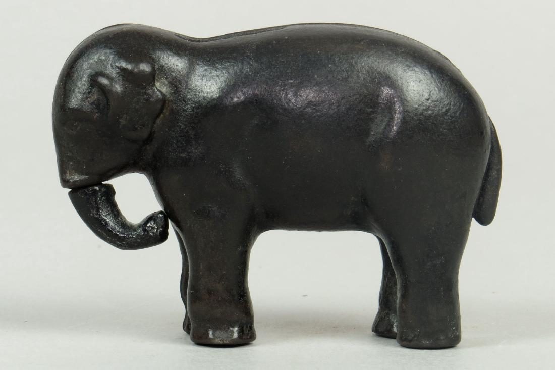 CI Elephant w/Swivel Trunk Bank (1 of 2)