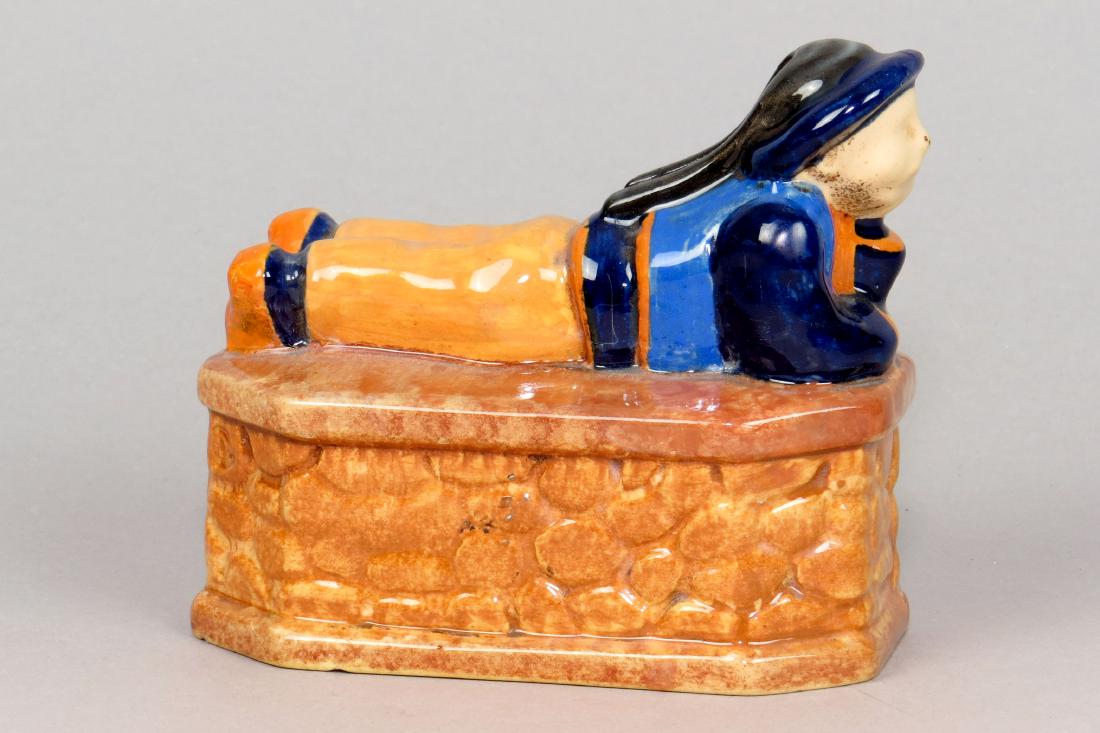 Ceramic Boy on Rock Base Bank (1 of 4)