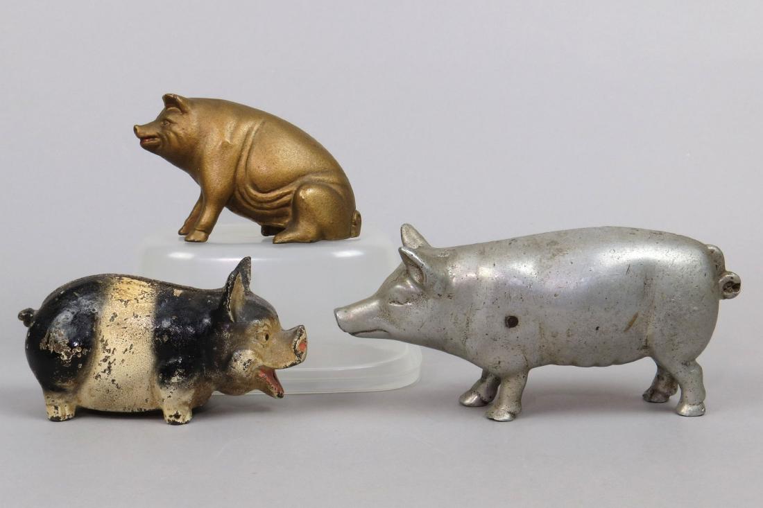 Lot of 3 CI/Alum. Pig Banks (1 of 2)