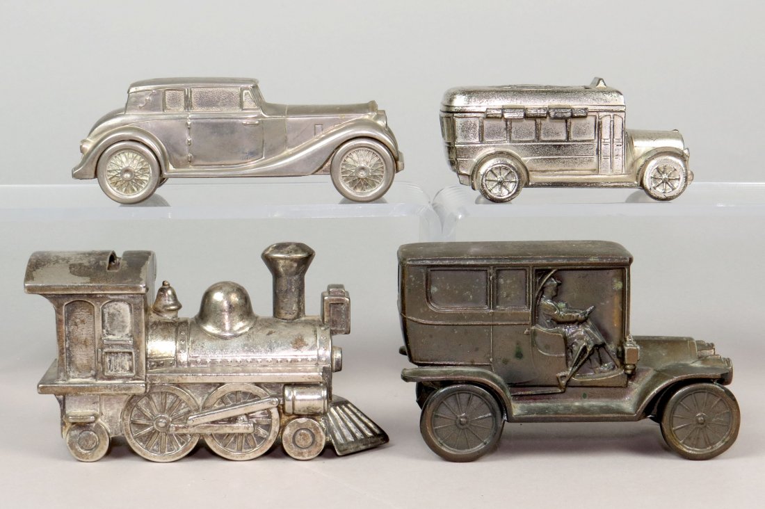 Lot of 4 PM Transportation Banks: 4 Transportation Banks, PM: Train Engine; Roadster; English Auto; Bus, marked "Germany"