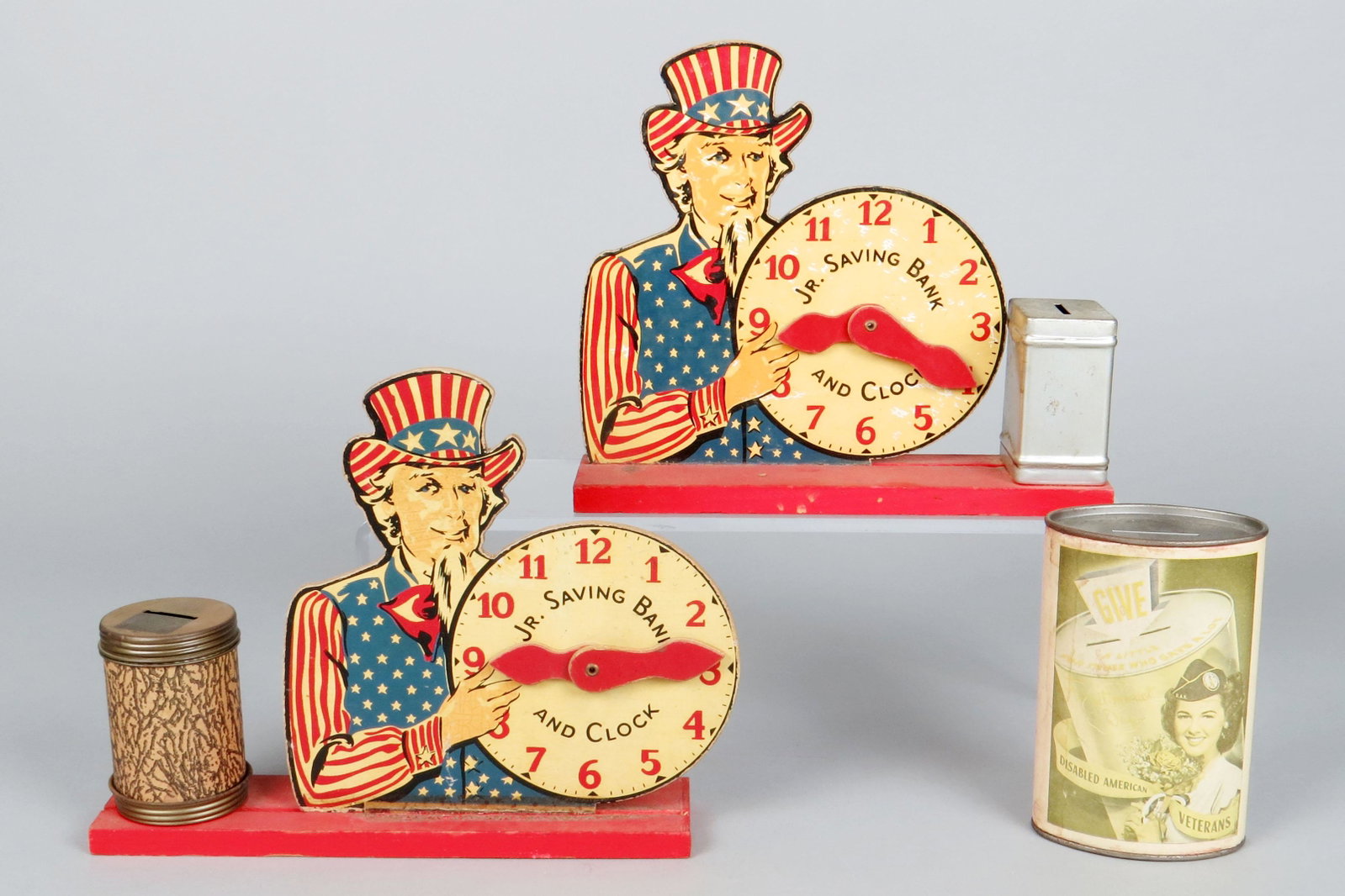 Lot of 3 War Related Banks: 3 War Related Banks: 2 Diff. Uncle Sam Clock Banks; Disabled Veteran Bank