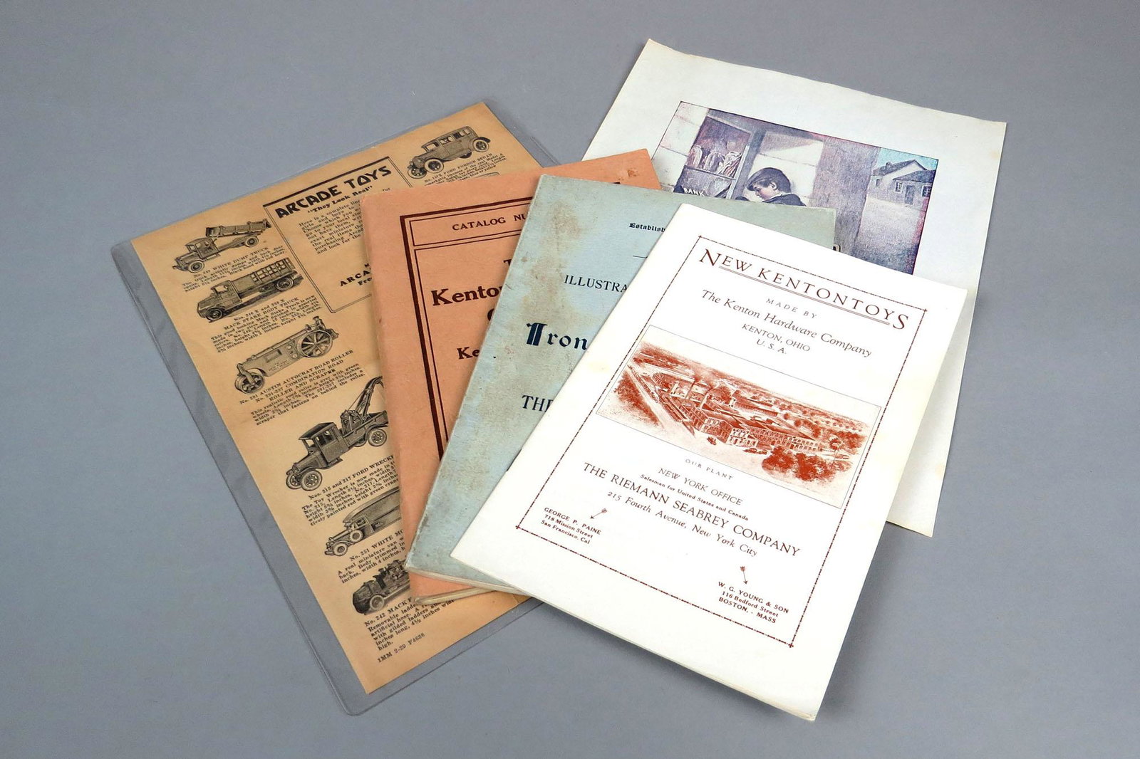 Lot of 5 Paper Misc. Catalogs, etc.: 5 Misc. Catalogs, etc.: "New Kenton Toys"; "Iron Toys - J&E Stevens"; "The Kenton Hardware Company"; Picture of boys admiring banks; "Arcade Toys" Flyer