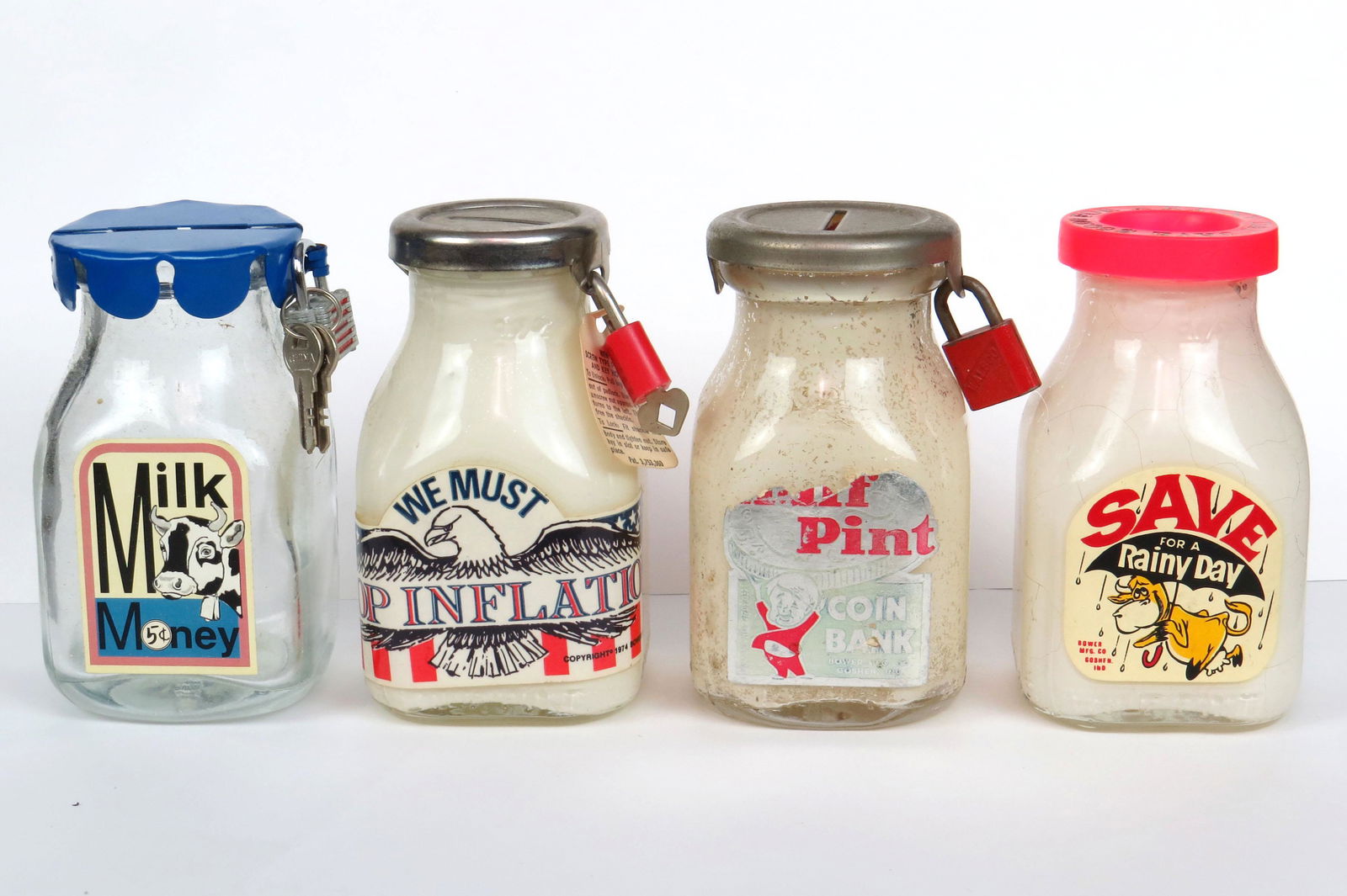 Lot of 4 Glass Bottle Banks (1 of 2)