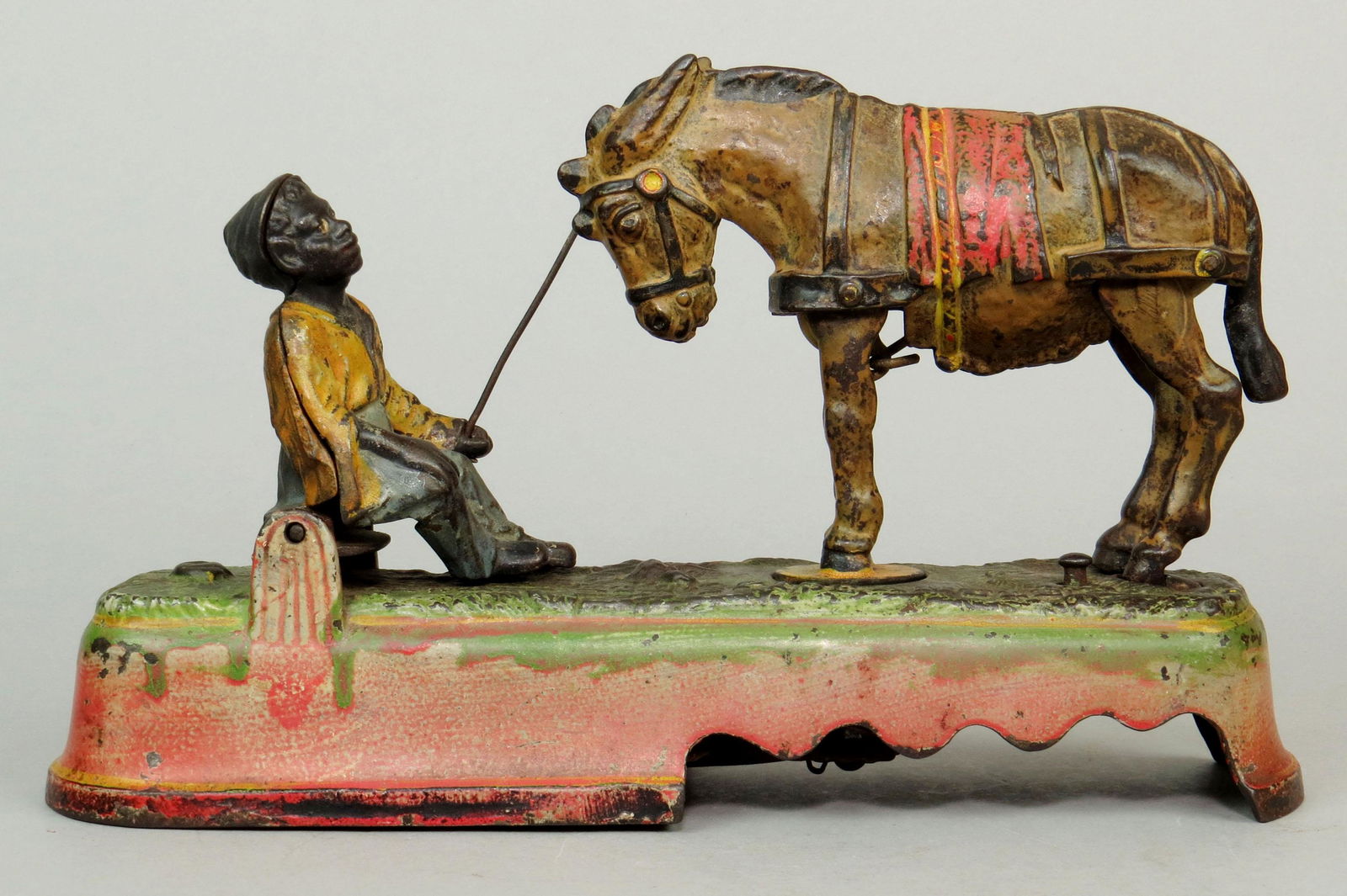 CI Spise a Mule, Bench Mechanical Bank (1 of 3)