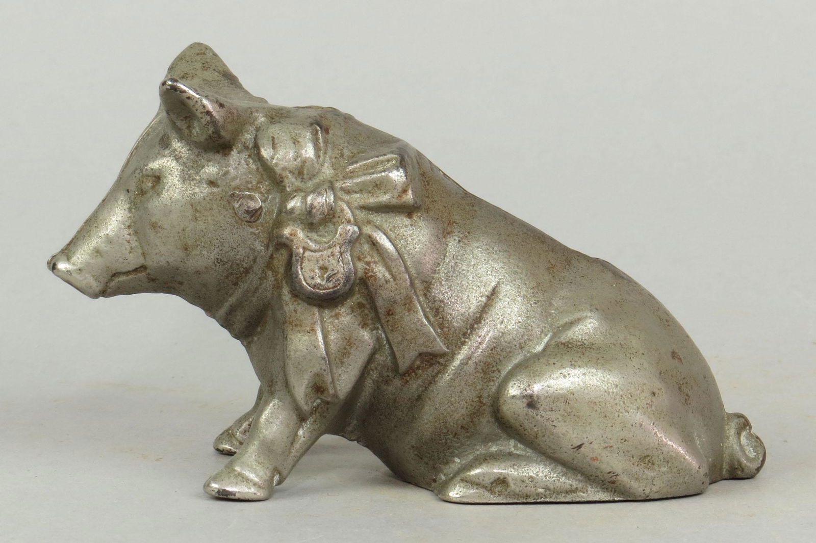 CI Seated Pig w/Bow Bank (1 of 2)