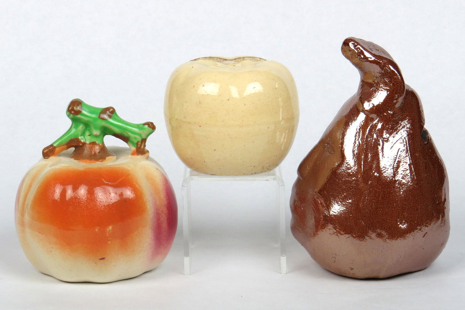 Lot of 3 Fruit Banks, Ceramic: 3 Fruit Banks, Ceramic: Gourd w/Twig, Marked "Japan"; Apple, One spot did not fill on finish (production flaw); Pear w/Face, 5"