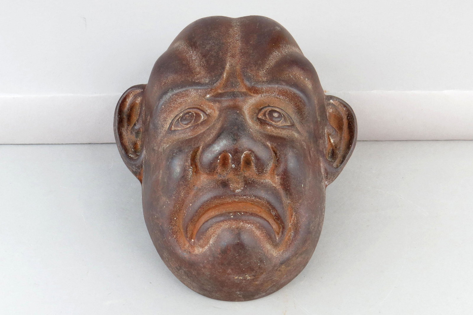 CI Frowning Face Bank (1 of 2)