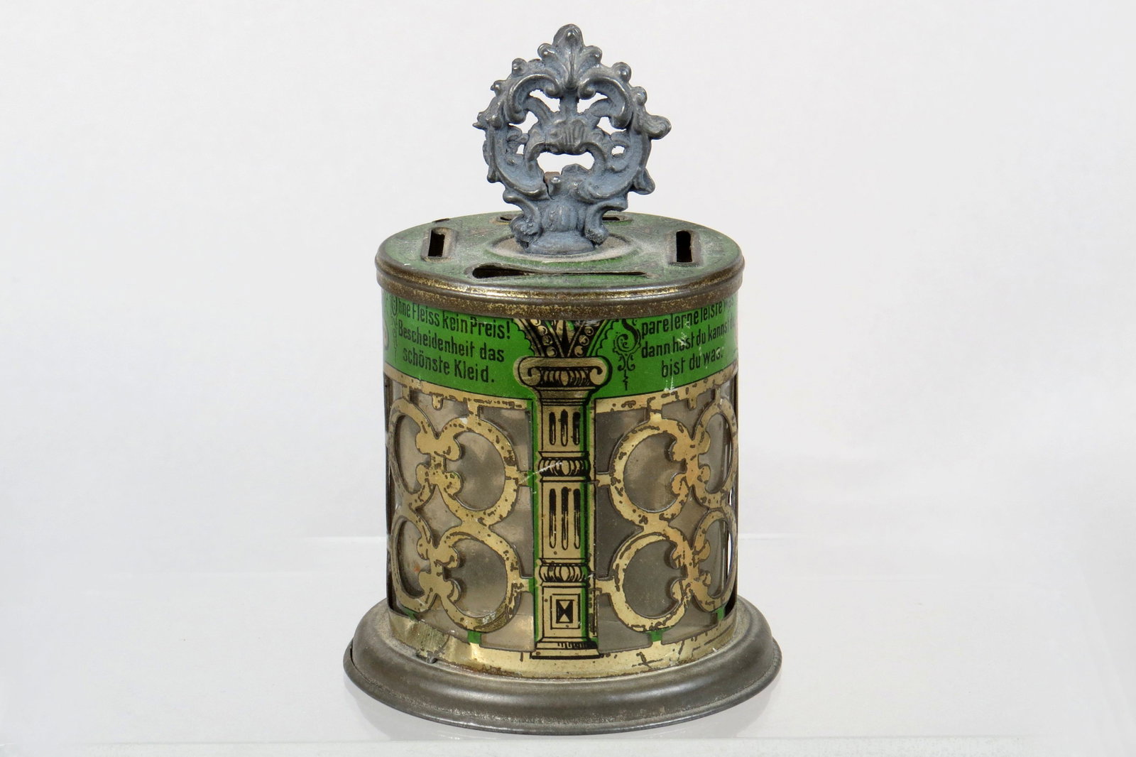 Cylinder w/Decoration Bank: Cylinder w/Decoration Bank, Tin/Celluloid. 4 1/8", 4 Coin slots