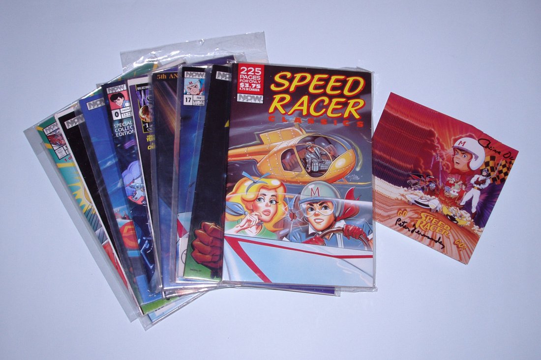 Lot of Speed Racer Items: 12 "Speed Racer" Comic Books in sealed packages, all in mint condition; 29 "Speed Racer" Advertising Cards, 5 of which are autographed by Corinne Orr and 4 autographed by Peter Fernandez. They were th