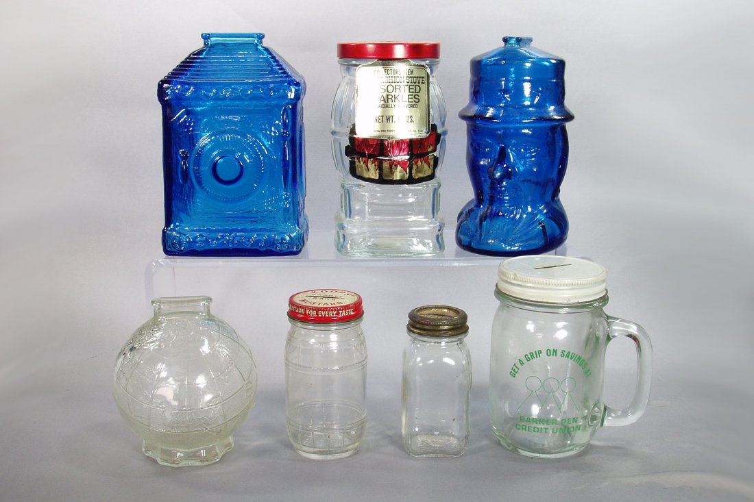 Lot of 7 Misc. Glass Banks: Pot Belly Stove; "Wheaton Federal Savings"; "Bank" Globe; "Parker Pen Credit Union" Mug; "Wheaton" Uncle Sam; "Koops Mustard Barrel"; "Atlas Mason" Jar