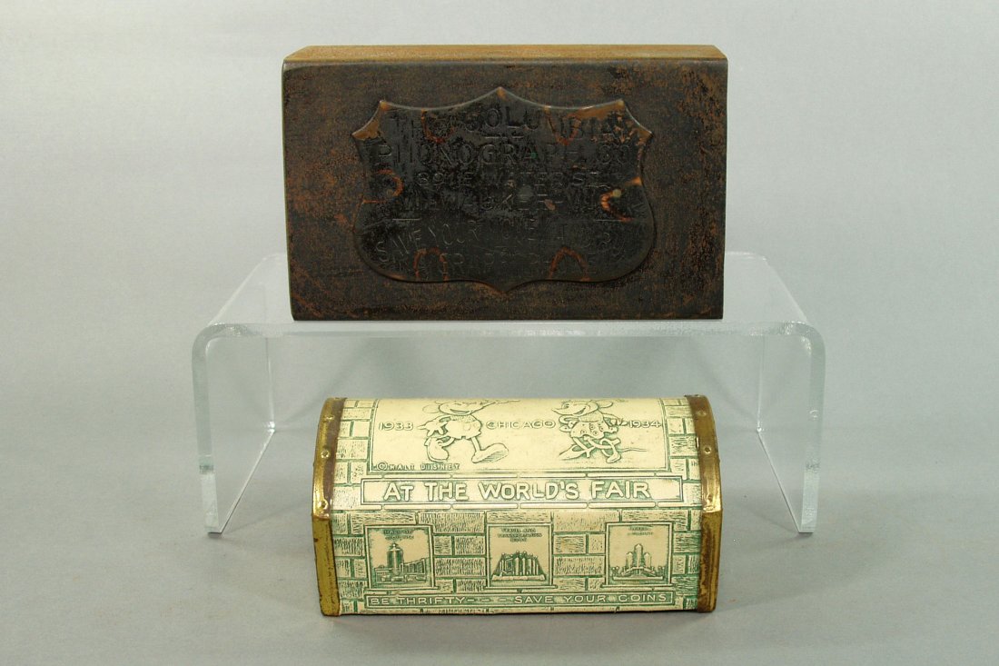 Lot of 2 Still Banks: "Mickey and Minnie at the World's Fair 1933-1934", 1 7/8", vinyl; "The Columbia Phonograph Co.", 3", sheet steel, missing the end with slot, rusty