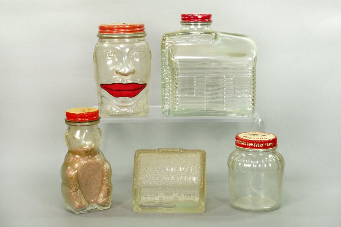 Lot of 5 Misc. Glass Still Banks: Log Cabin, 4 7/8"; "Pittsburgh Paints" House, 2 3/4"; "Lucky Joe", 4 1/2"; Bear w/original contents, 4 5/8"; "Koops Barrel Bank", 3 1/4"