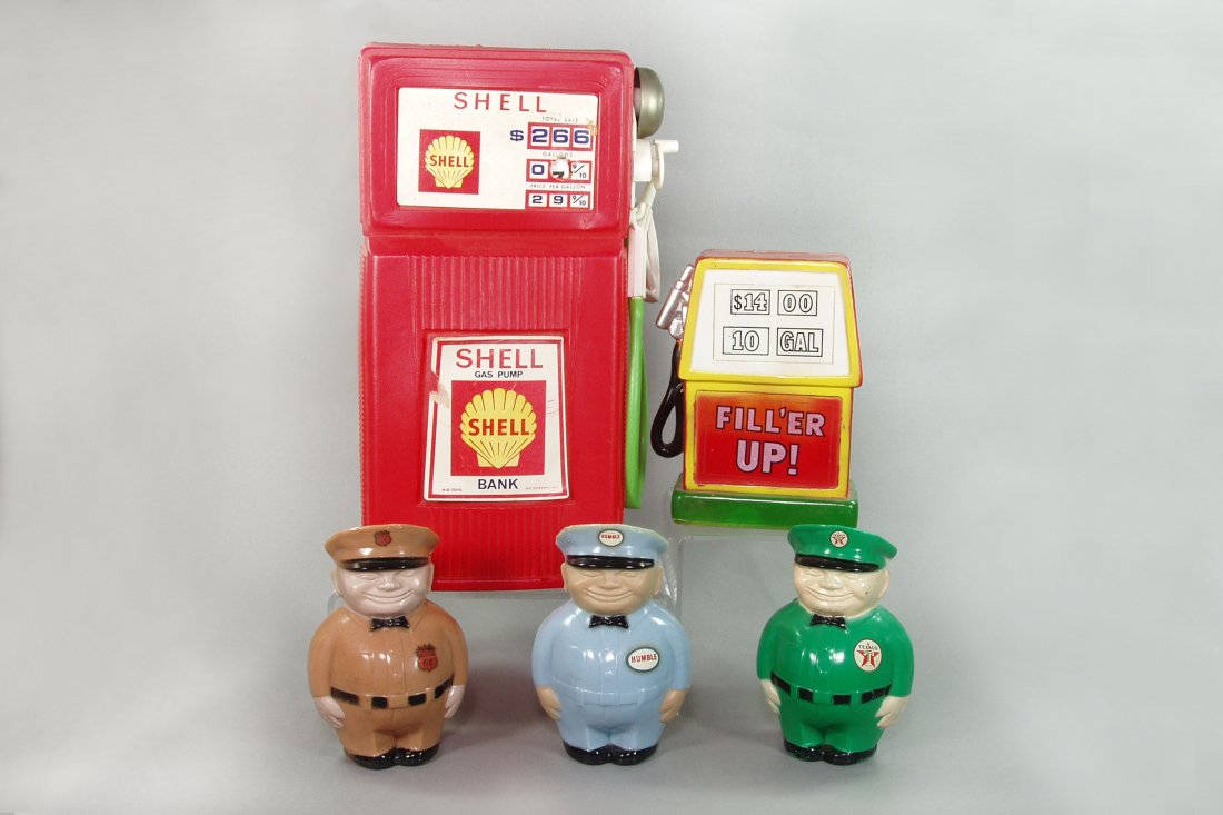 Lot of 5 Gasoline Related Still Banks: "Shell" Gas Pump, 11 1/2", damage at bottom; "Fill 'er Up" Pump, 5 7/8", 3 Service Station Attendants: "Phillips 66", "Texaco", "Humble", 4 7/8"