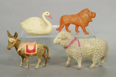Lot of 4 Celluloid Animals: Lot of 4 Celluloid Animals: Swan; Lion; Mule, has tiny crack; Lamb