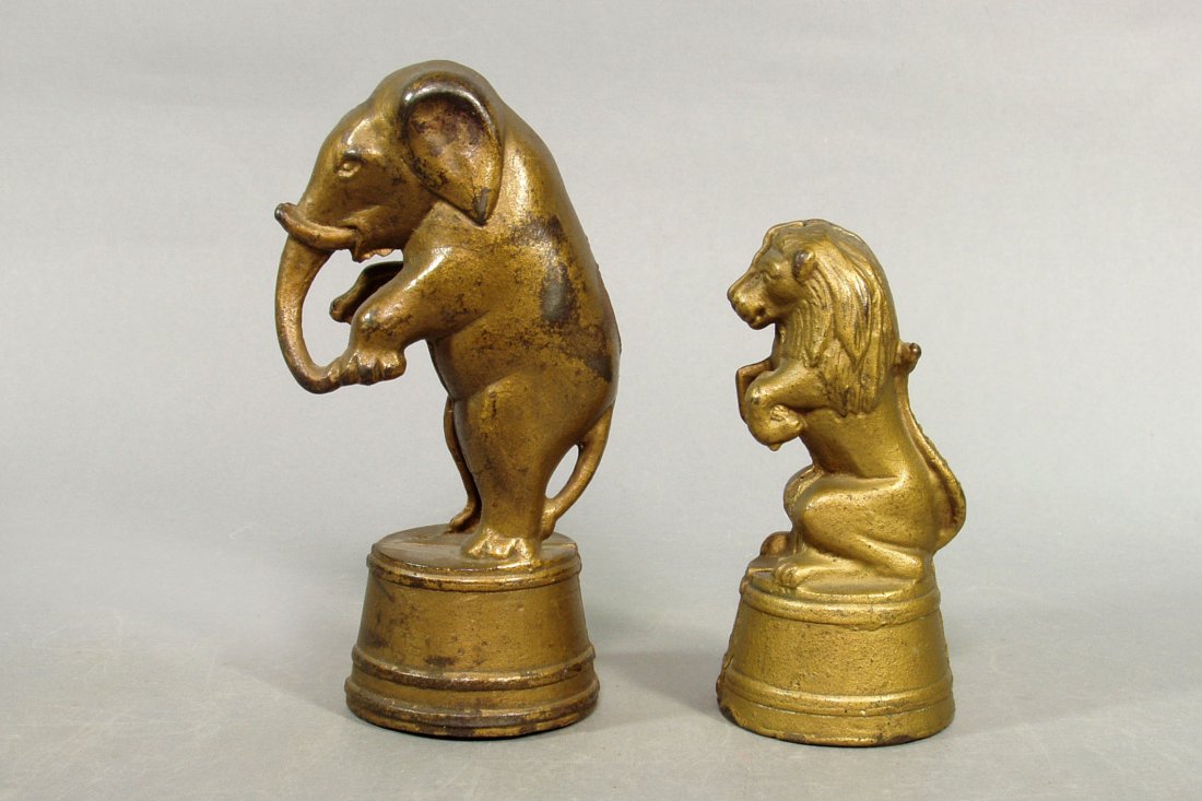 Lot of 2 CI Animal Banks: Standing Elephant on Tub; Sm. Lion on Tub