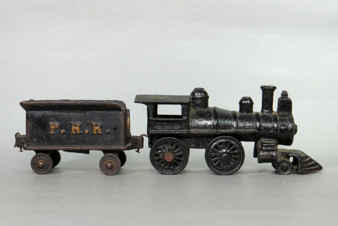 Lot of 2: Engine and Tender: Engine and Tender, marked "P.R.R." on Tender, Engine, repainted, Engine is 3 1/4" high
