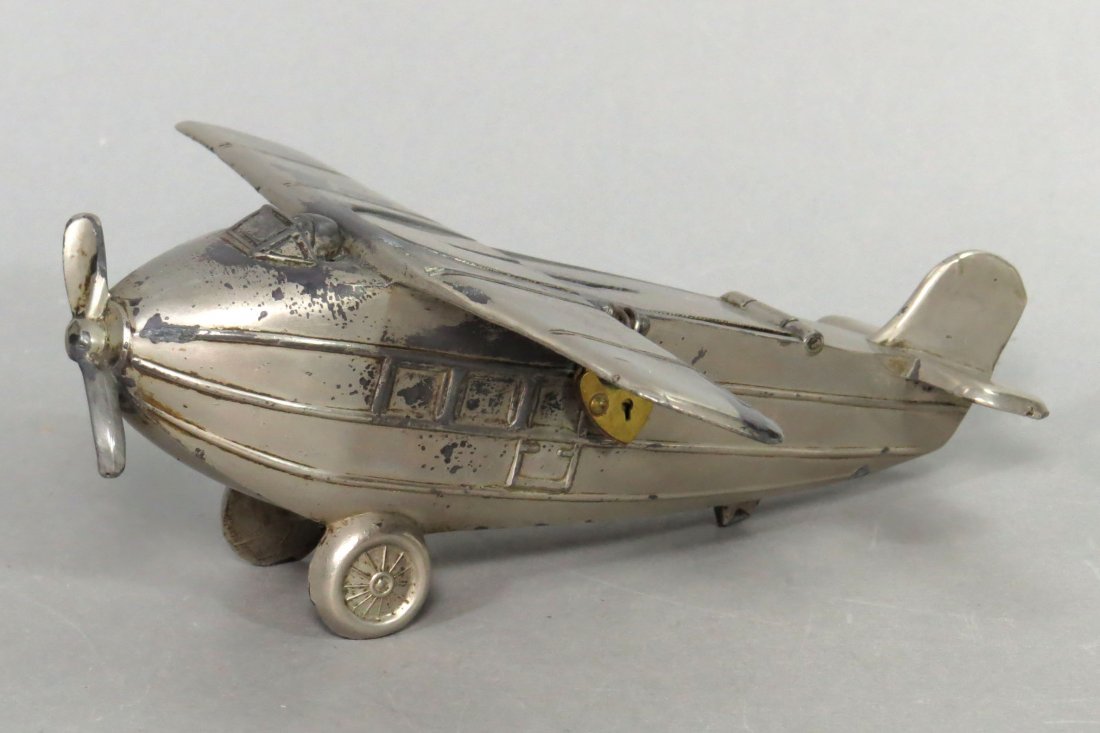 Airplane w/Trick Lock Silvered Lead Bank (1 of 2)