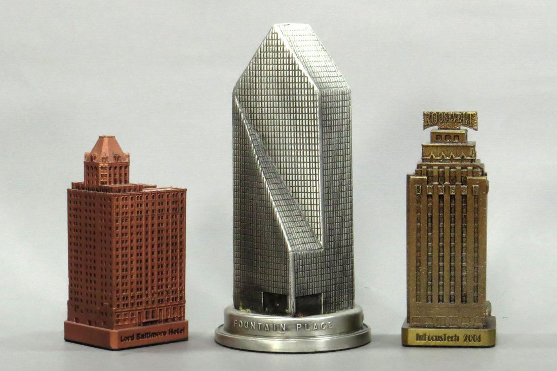 Lot of 3 Souvenir Buildings: 3 Souvenir Bldgs., pewter and lead: "Fountain Place Dallas Texas", 6 1/2"; "Roosevelt Hotel 2004 Seattle", 4 3/4"; "Lord Baltimore Hotel Baltimore 2006", 4 1/4"