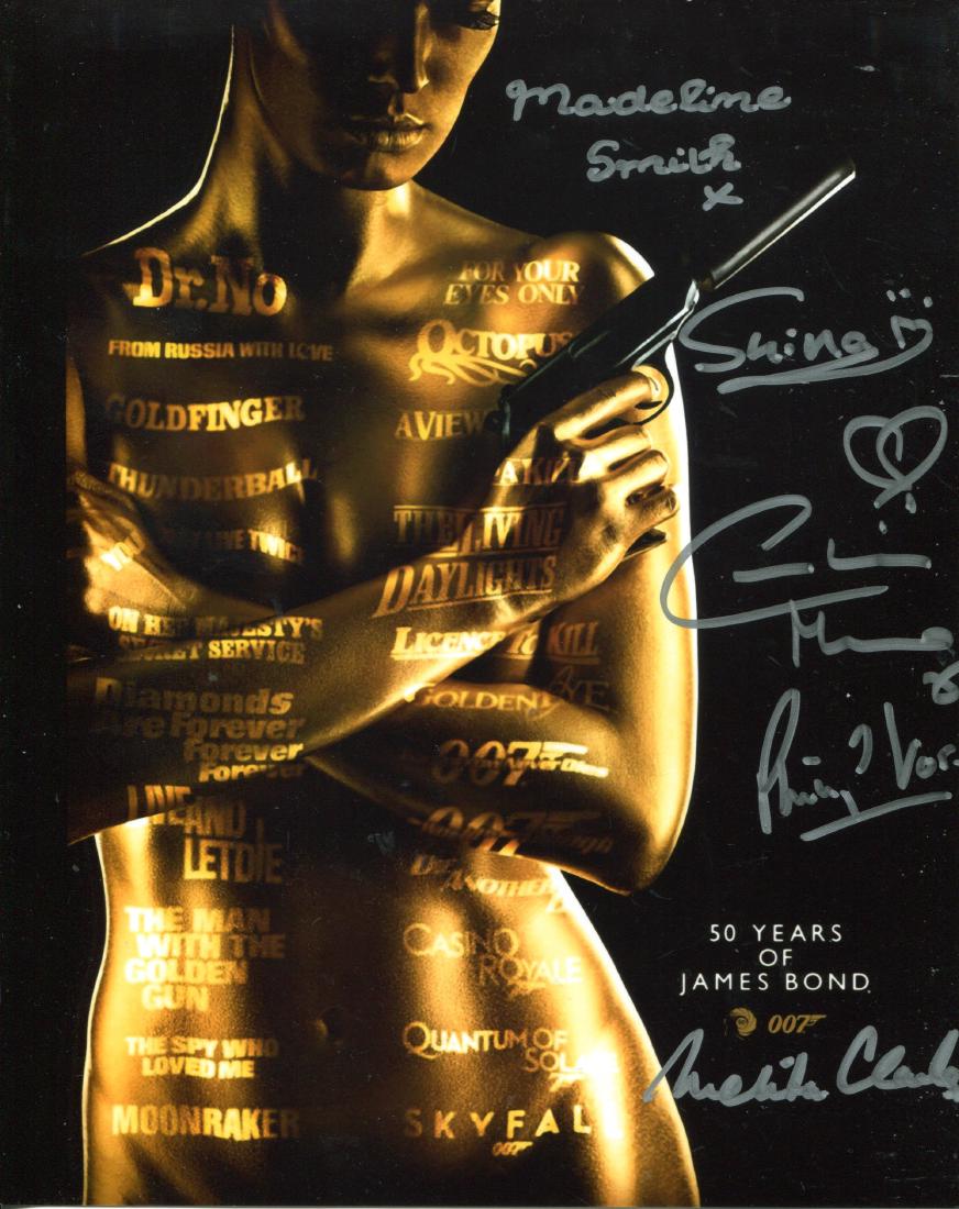 James Bond Multi Signed. 8 x 10 inch photo signed by: James Bond Multi Signed. 8 x 10 inch photo signed by FIVE Bond actors Shihina Nagai, Caroline Munro, Melita Clarke, Philip Voss and Madeline Smith. Good Condition. All signed pieces come with a Certif