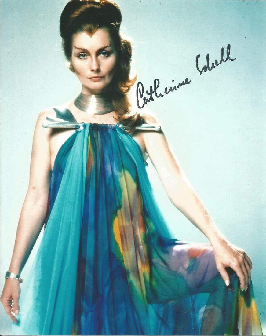 Catherine Schell Space: 1999 hand signed 10x8 photo.: Catherine Schell Space: 1999 hand signed 10x8 photo. This beautiful hand signed photo depicts Catherine Schell in her role as Maya in the clssic scifi tv show, Space 1999. This signed photo is guarant