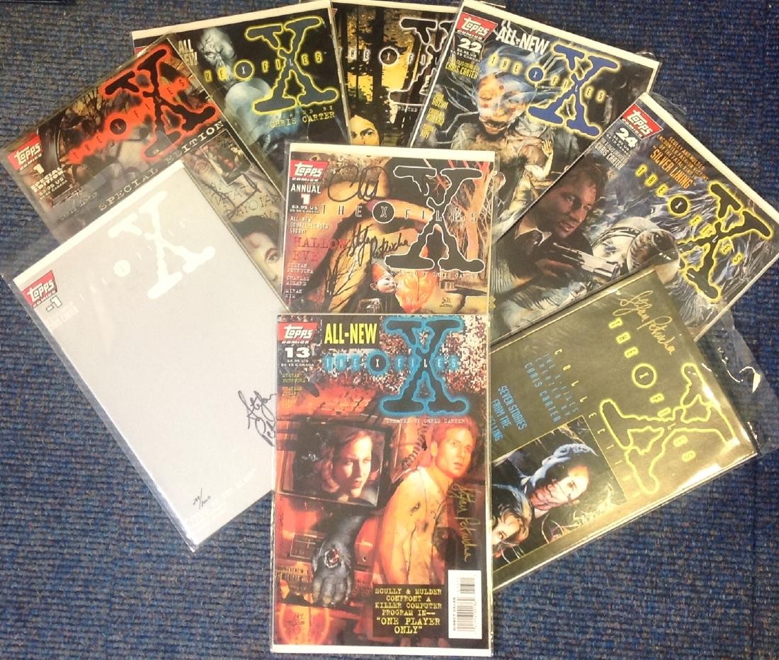 Signed comic collection. 9 included. Some of signatures (1 of 1)