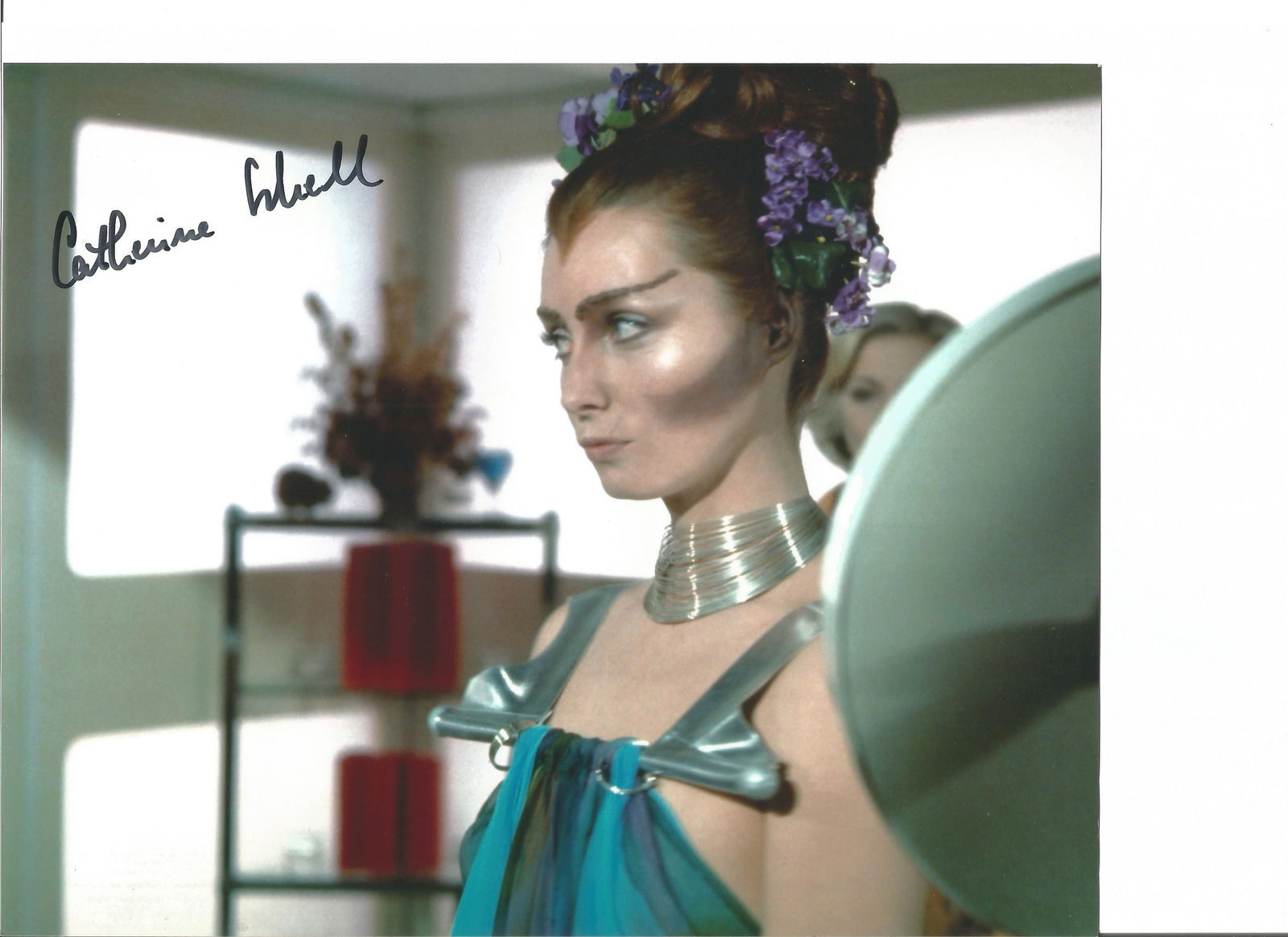 Catherine Schell Space: 1999 hand signed 10x8 photo.: Catherine Schell Space: 1999 hand signed 10x8 photo. This beautiful hand signed photo depicts Catherine Schell in her role as Maya in the classic scfi tv show, Space 1999. This signed photo is guarant