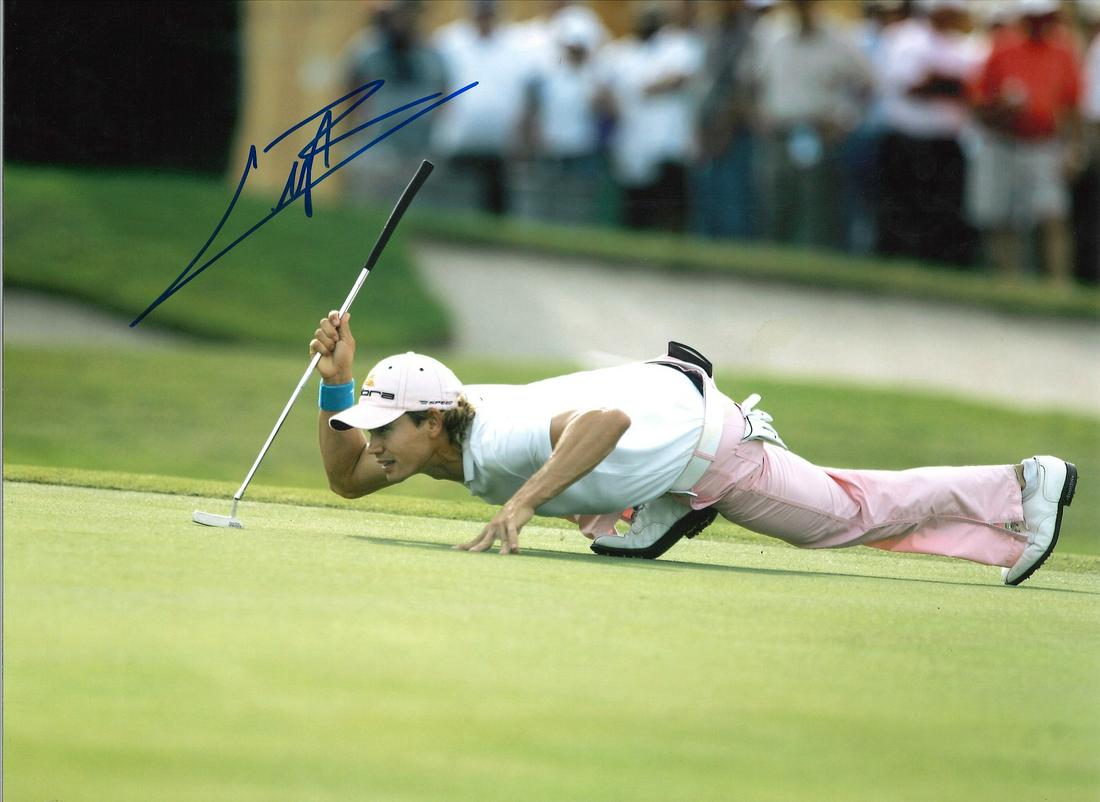 Camilo Villegas Signed 16 x 12 inch golf photo. Good: Camilo Villegas Signed 16 x 12 inch golf photo. Good Condition. All autographs are genuine hand signed and come with a Certificate of Authenticity. We combine postage on multiple winning lots and can