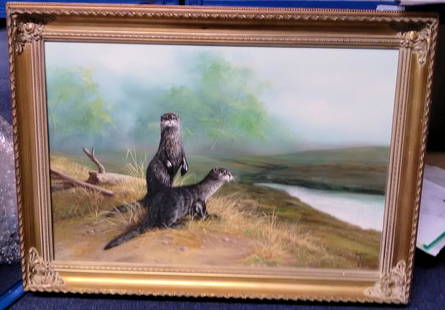 Otters original oil painting on canvas in attractive: Otters original oil painting on canvas in attractive gilt frame signed Nanee/ Nance? Approx 36 x 25 inches overall. Lovely scene of two otters in foreground and lake or Loch in background. Superb.