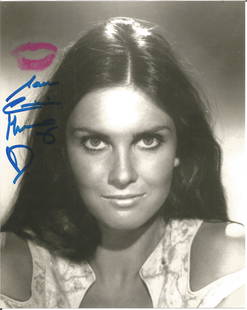 James Bond actress Caroline Munro signed 10 x 8 b/w: James Bond actress Caroline Munro signed 10 x 8 b/w photo to which she has kissed the photo leaving a lipstick mark. Good Condition. All autographs are genuine hand signed and come with a Certificate