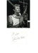 Charlton Heston signature piece mounted below black and