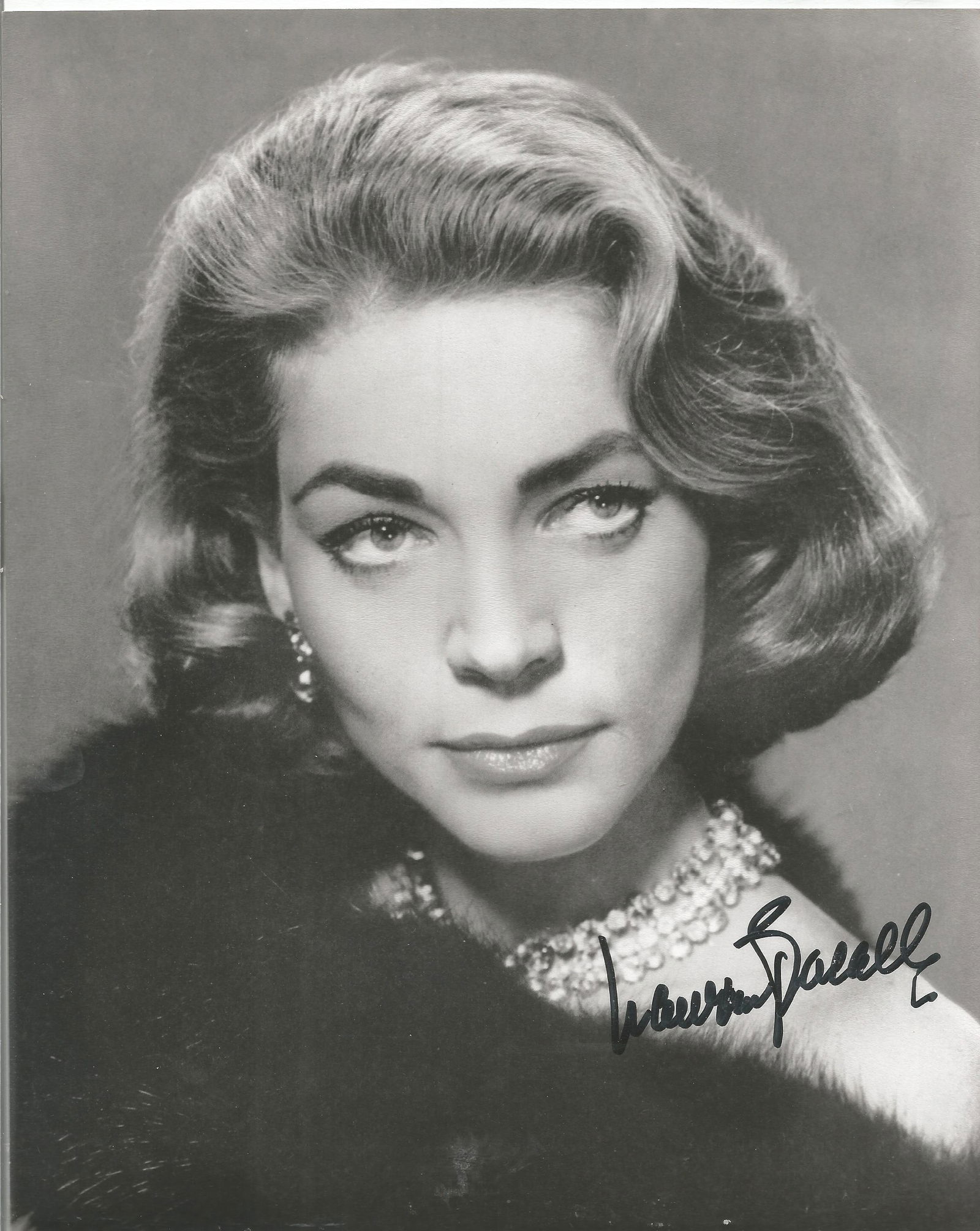 Actress Lauren Bacall signed 10 x 8 b/w portrait photo. (1 of 1)