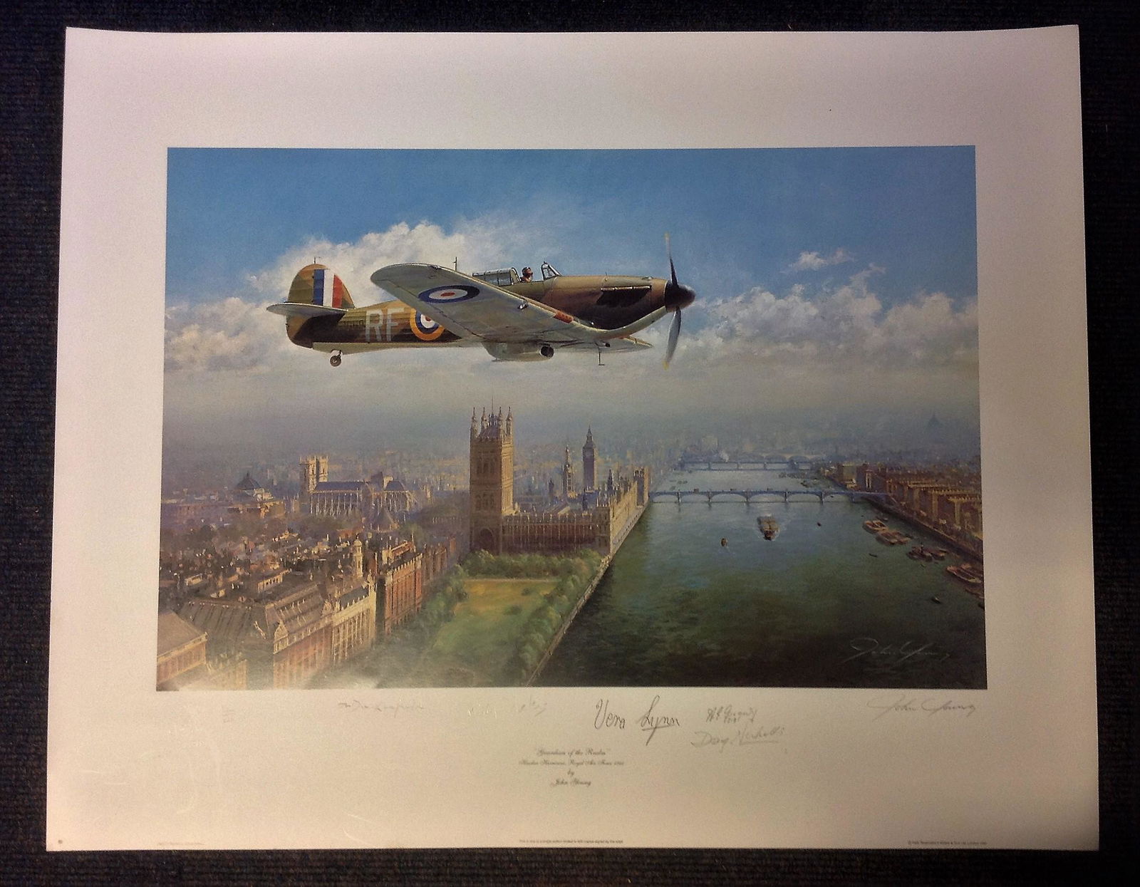 Battle of Britain Print 24x30 titled Guardian of the: Battle of Britain Print 24x30 titled Guardian of the Realm signed by the artist John Young Dame Vera Lynn and four Fighter command veterans includes Ron Duckenfield, A. E Gregory DFC, AE, Doug Nicholl