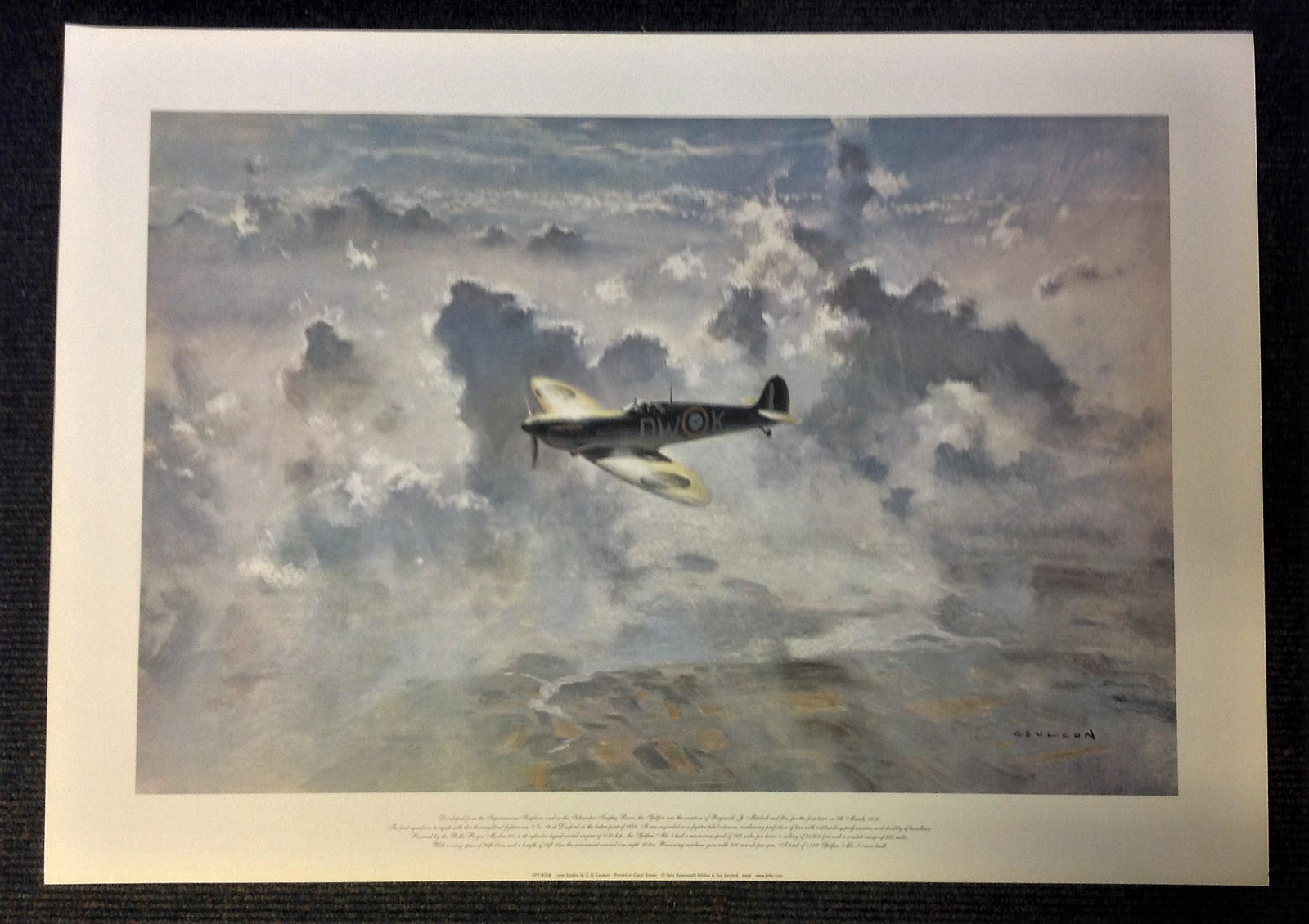 Battle of Britain print titled Lone Spitfire by the: Battle of Britain print titled Lone Spitfire by the artist Gerald Coulson picturing the iconic plane in flight. Good Condition. All autographs are genuine hand signed and come with a Certificate of Au