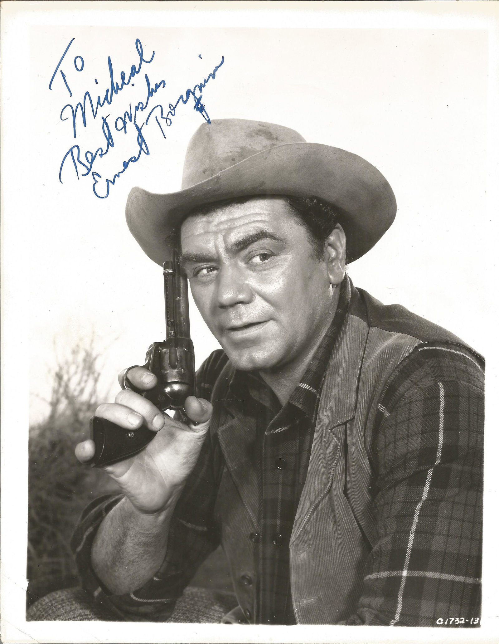 Ernest Borgnine signed 10 x 8 inch b/w portrait photo,: Ernest Borgnine signed 10 x 8 inch b/w portrait photo, to Michael. Young image western movie outfit. Condition 8/10. All autographs come with a Certificate of Authenticity. We combine postage on multi
