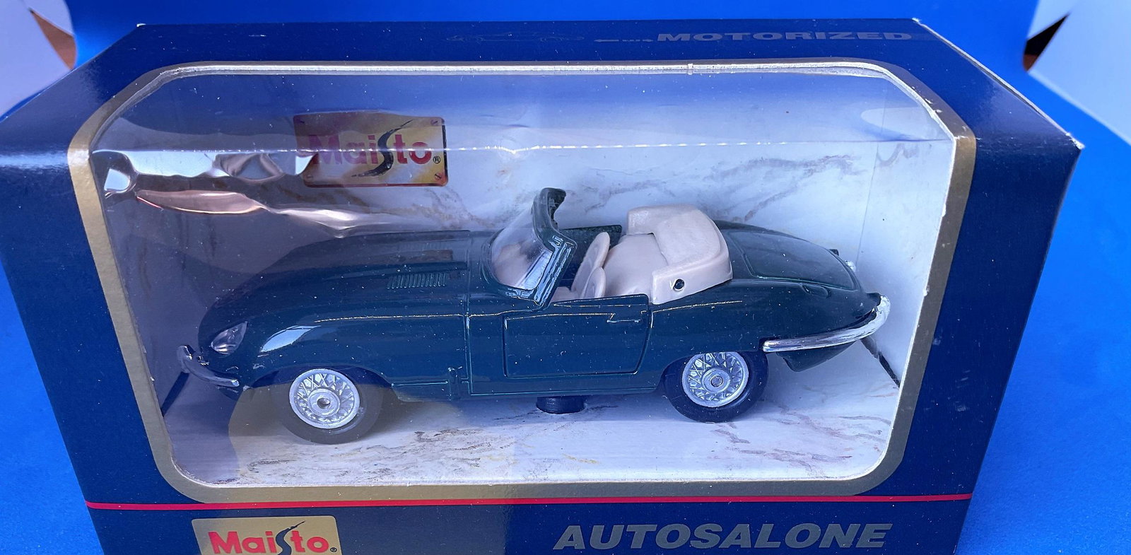Vintage Toys. Autosalone. Jaguar. A Die-Cast and: Vintage Toys. Autosalone. Jaguar. A Die-Cast and plastic pull back action car, with opening doors. In original packaging. Mint condition. Unopened. Good Condition. All autographs are genuine hand sign